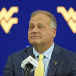 Rich Rodriguez talks filling WVU football's final roster spots, NFL players joining college roster